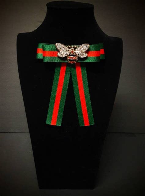 gucci brooch pin|Gucci bow tie brooch.